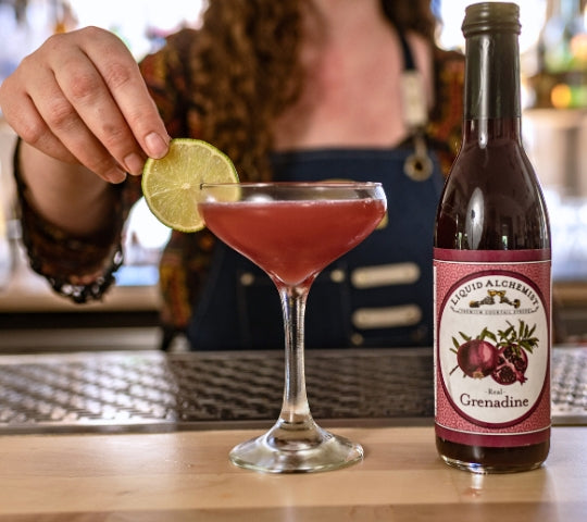 A Mixologist's Pomegranate Holiday Cocktail with Seasonal Spice and Depth