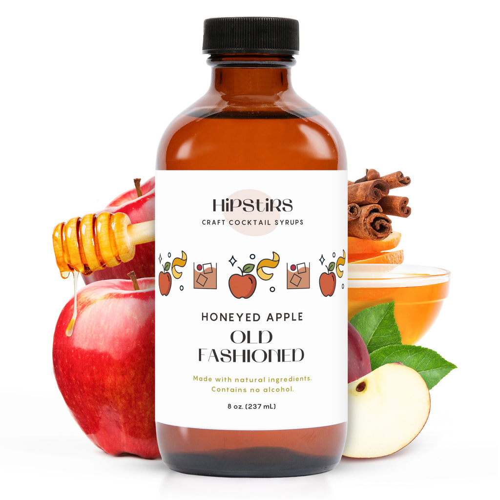 HipStirs Honeyed Apple Old Fashioned syrup bottle with apples, honey and cinnamon